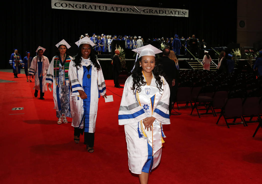 College of Southern Nevada High School students, including Maraki Abera, front, leads the proce ...