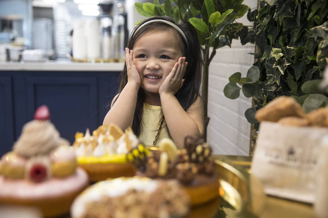 Ava Qassamali, 3, is overwhelmed by all the dessert choices at Saint Honore on Saturday, June 1 ...