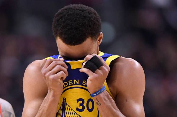 Golden State Warriors guard Stephen Curry (30) reacts during the second half of Game 1 of the t ...