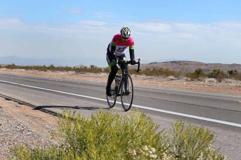 A cyclist rides his bike near Red Rock Canyon in Las Vegas. (Bizuayehu Tesfaye/Las Vegas Review ...