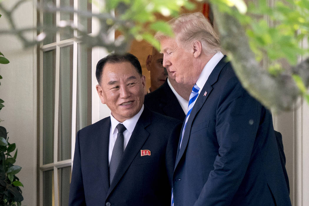 FILE - In this June 1, 2018, file photo, U.S. President Donald Trump, right, talks with Kim Yon ...