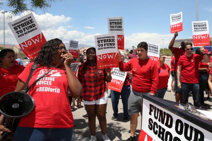 Linda Jones shouts slogans as about 50 members and supporters of the Clark County Education Ass ...