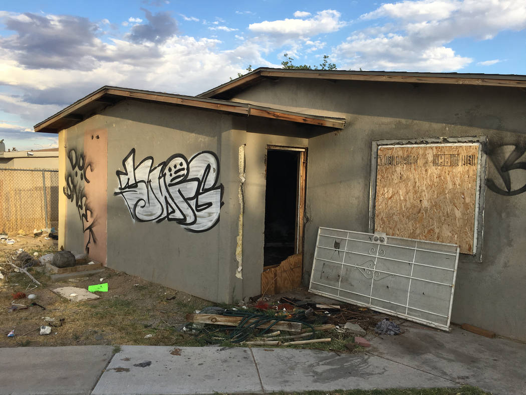A boarded-up, foreclosed house at 600 Kasper Ave., photographed on Thursday, May 30, 2019, in L ...