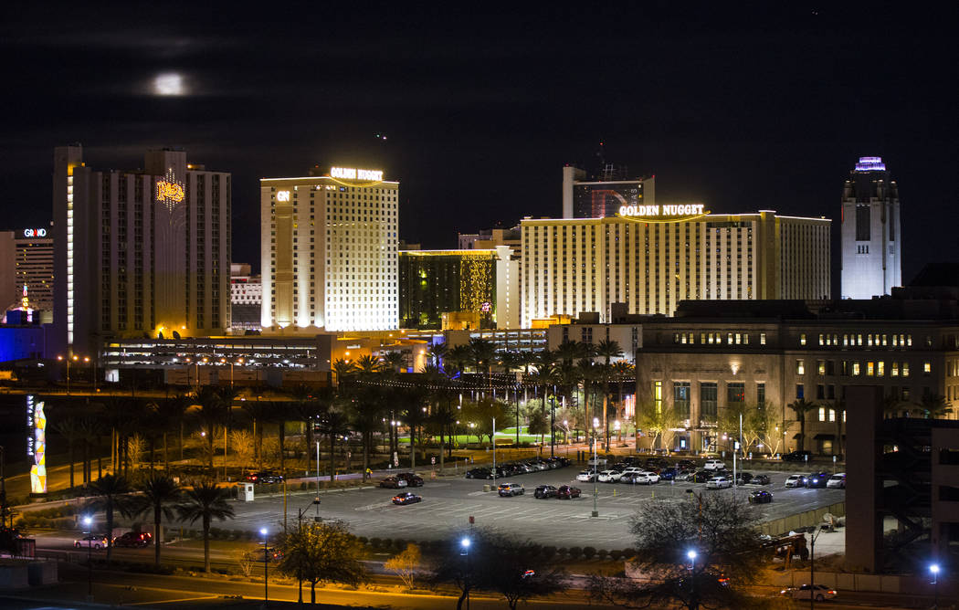 A super snow moon rises over the Plaza in downtown Las Vegas as seen from the World Market Cent ...