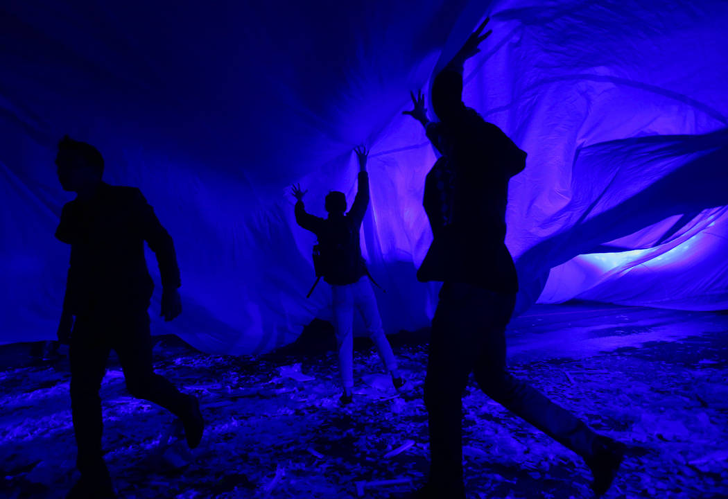 Cast members in "Fuerza Bruta" perform as part of a media preview at the show's tent ...