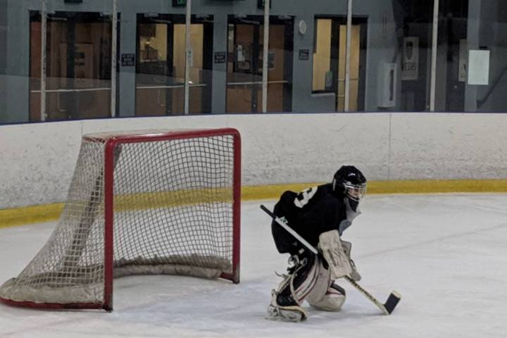 Jake Kielb, who plays on the PeeWee team, is in net at Sobe Ice Arena. (Gina Kielb)