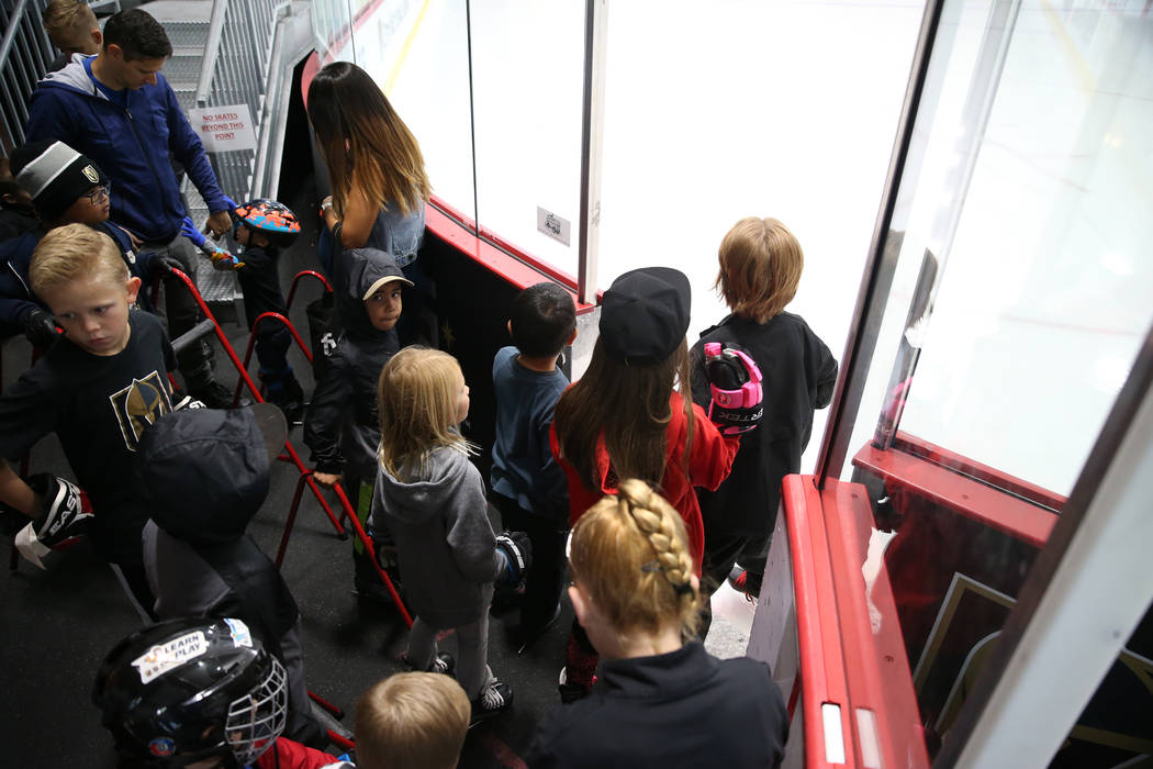 Children get ready to take the ice for the Jake Kielb's Hockey Foundation open skate session at ...