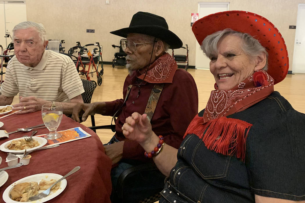 Bernice Gaar, center, and Olga Gaar, right, have attended the 90-plus banquet for around three ...