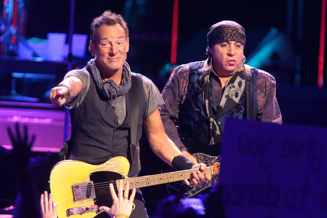 Bruce Springsteen, left, and Steven Van Zandt perform in concert with the E Street Band during ...