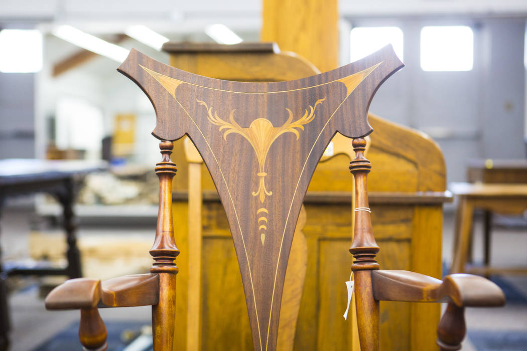 Woodwork design on a chair, from Walking Box Ranch in Searchlight, is seen at UNLV's Paradise c ...