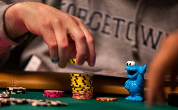 Jeremy Wien, of Westchester, N.Y., has his daughter's Cookie Monster toy as a lucky charm durin ...
