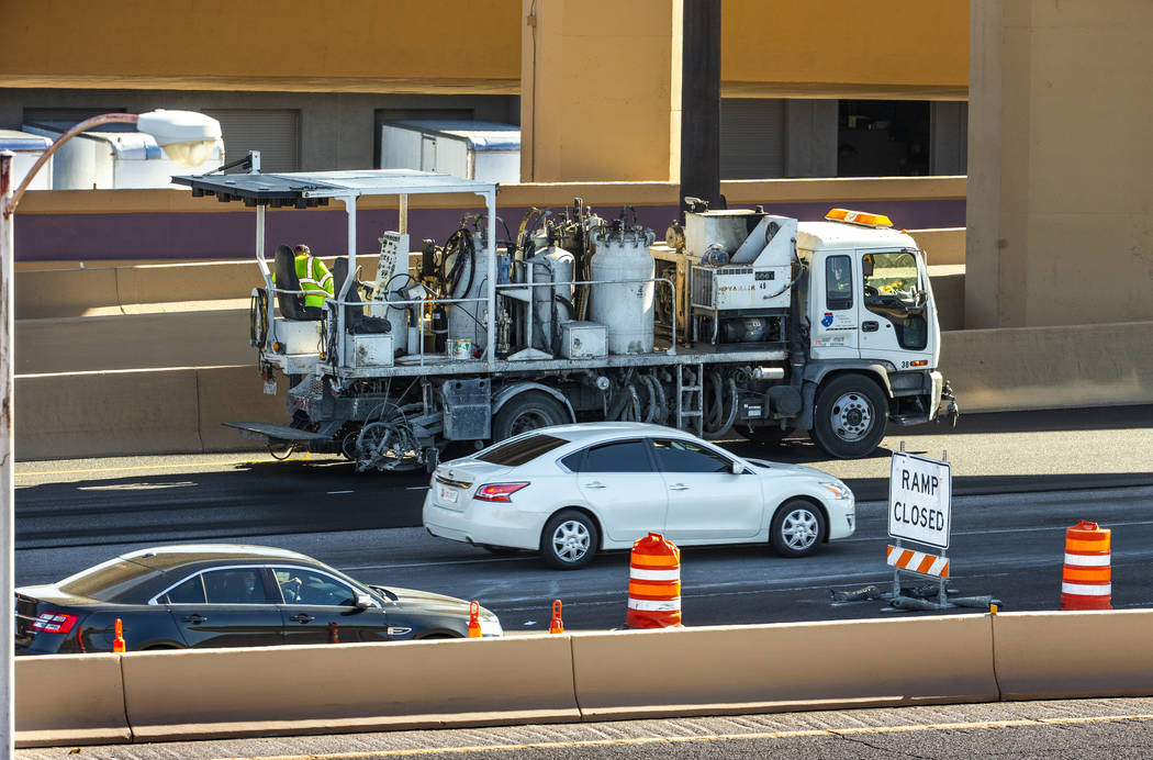 Traffic lanes are reduced on U.S. Highway 95 as paving efforts related to Project Neon restrict ...