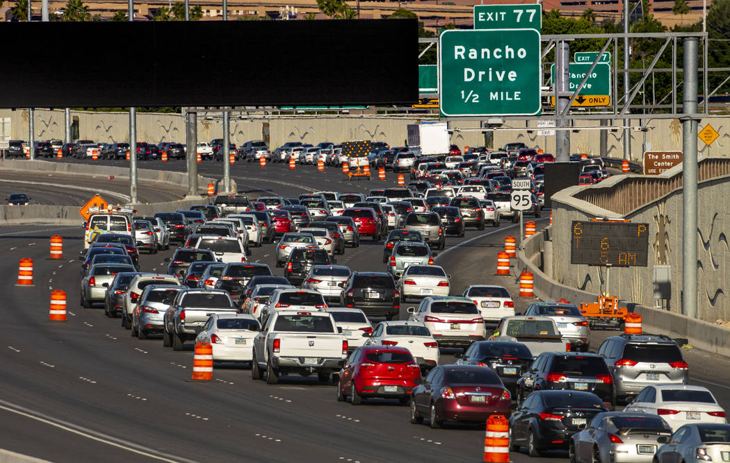 Traffic lanes are reduced on U.S. Highway 95 approaching Rancho Drive as paving efforts related ...