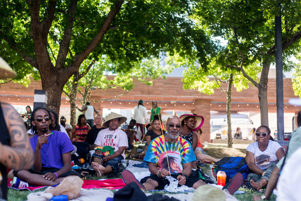 A crowd listens to live reggae music at the Clark County Amphitheatre during Reggae in the Dese ...
