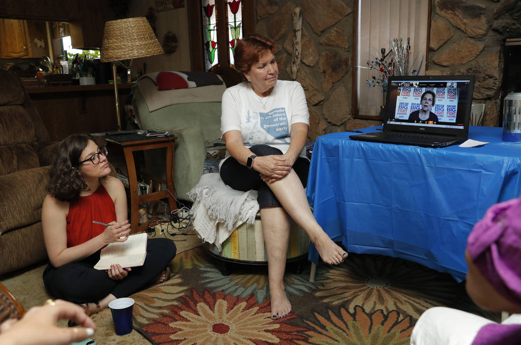 In this Friday, May 31, 2019, photo, Oriana Shulevitz Rosado, left, and Donna West watch as Dem ...