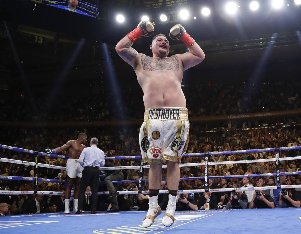 Andy Ruiz celebrates after stopping British boxer Anthony Joshua during the seventh round of a ...