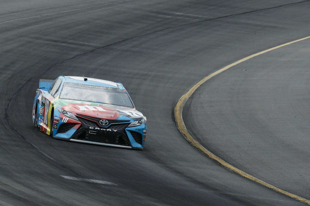 Kyle Busch enters Turn 1 during a NASCAR Cup Series auto race at Pocono Raceway, Sunday, June 2 ...