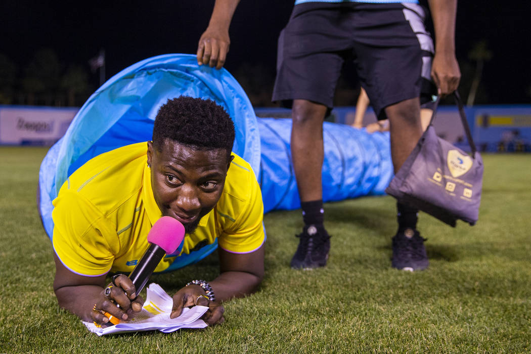 Las Vegas Lights FC hype man Robert "Bojo" Ackak navigates a plastic pip used for a d ...