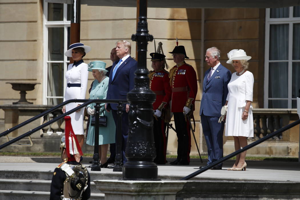 President Donald Trump stands with Queen Elizabeth II, with first lady Melania Trump, left, and ...