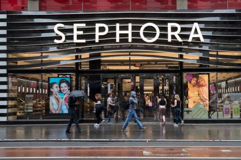 Pedestrians walk past a Sephora store in New York. (Mary Altaffer/AP)