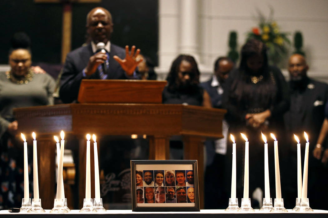 Candles representing twelve victims of a shooting at a municipal building in Virginia Beach, Va ...