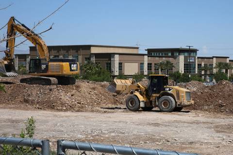 A luxury apartment complex construction site behind Life Time Athletic is seen on Monday, June, ...
