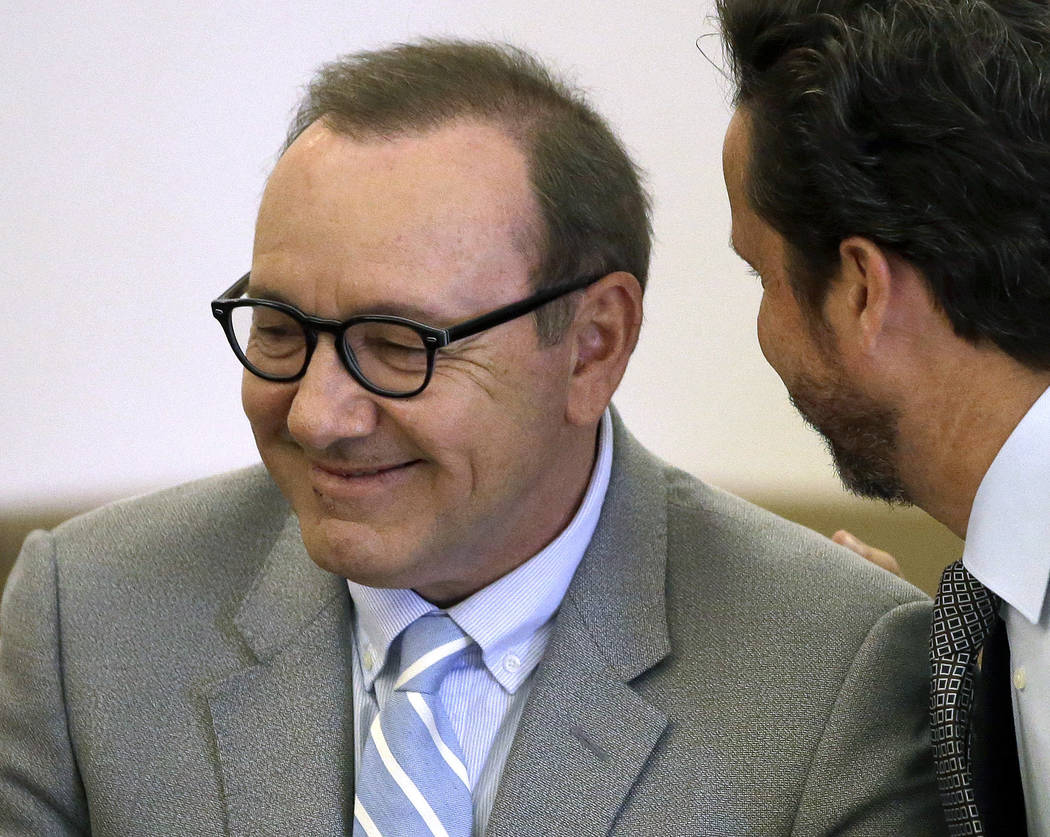 Actor Kevin Spacey listens to attorney Alan Jackson during a pretrial hearing on Monday, June 3 ...