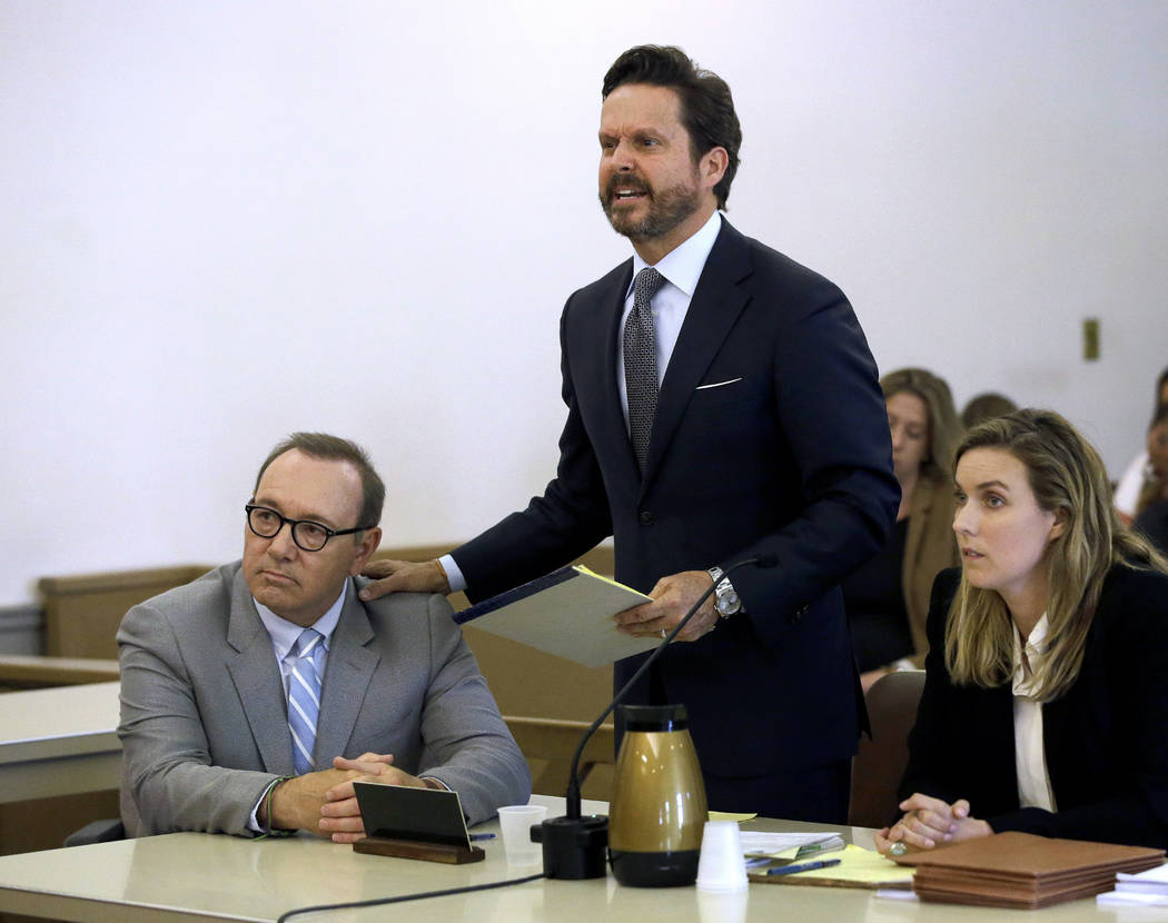 Actor Kevin Spacey, left, listens to attorney Alan Jackson address the court during a pretrial ...