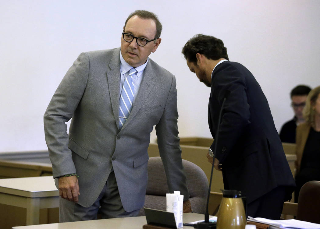 Actor Kevin Spacey arrives with his attorney Alan Jackson, right, for a pretrial hearing on Mon ...