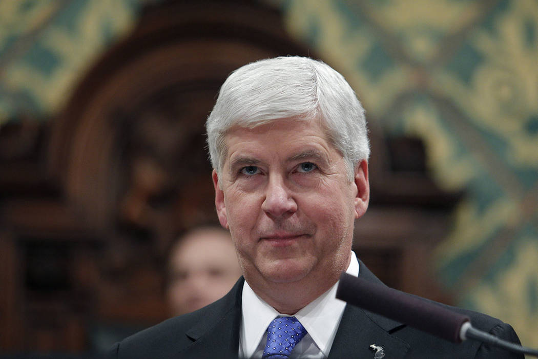 FILE - In this Tuesday, Jan. 23, 2018, file photo, Michigan Gov. Rick Snyder delivers his State ...