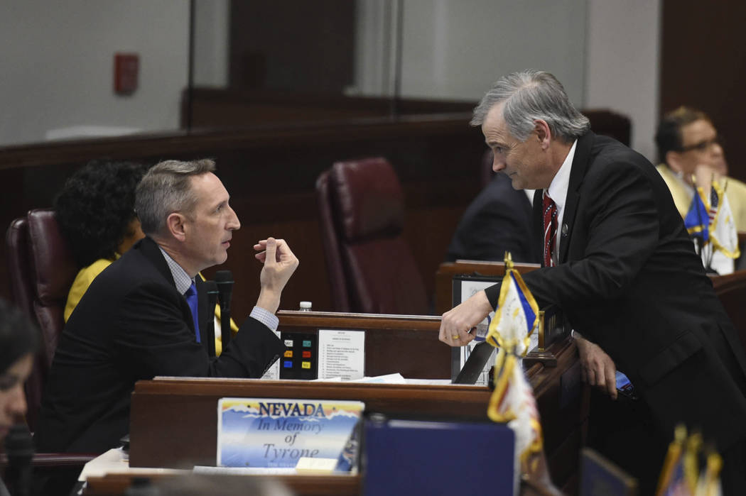 Nevada state Sens. Scott Hammond, left, and James Settelmeyer chat during a break on the Senate ...