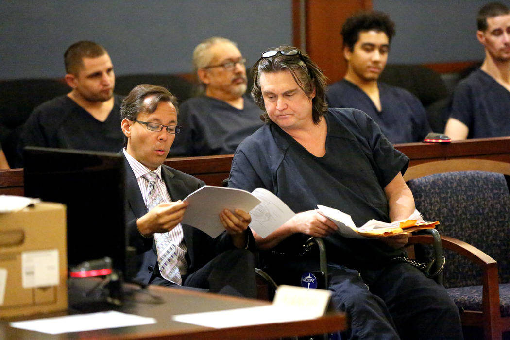 Mark Georgantas, right, the man who’s criminal record includes white-collar financial fr ...