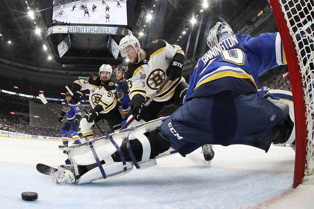 Boston Bruins center Charlie Coyle (13) scores a goal against St. Louis Blues goaltender Jordan ...