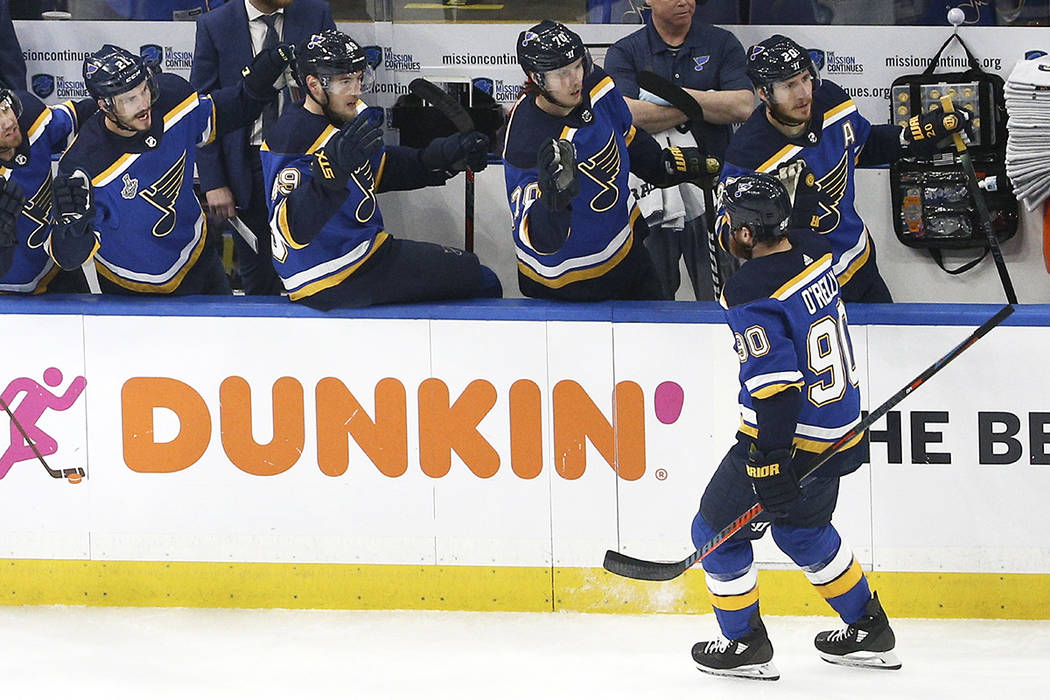 St. Louis Blues center Ryan O'Reilly (90) is congratulated after scoring a goal against the Bos ...