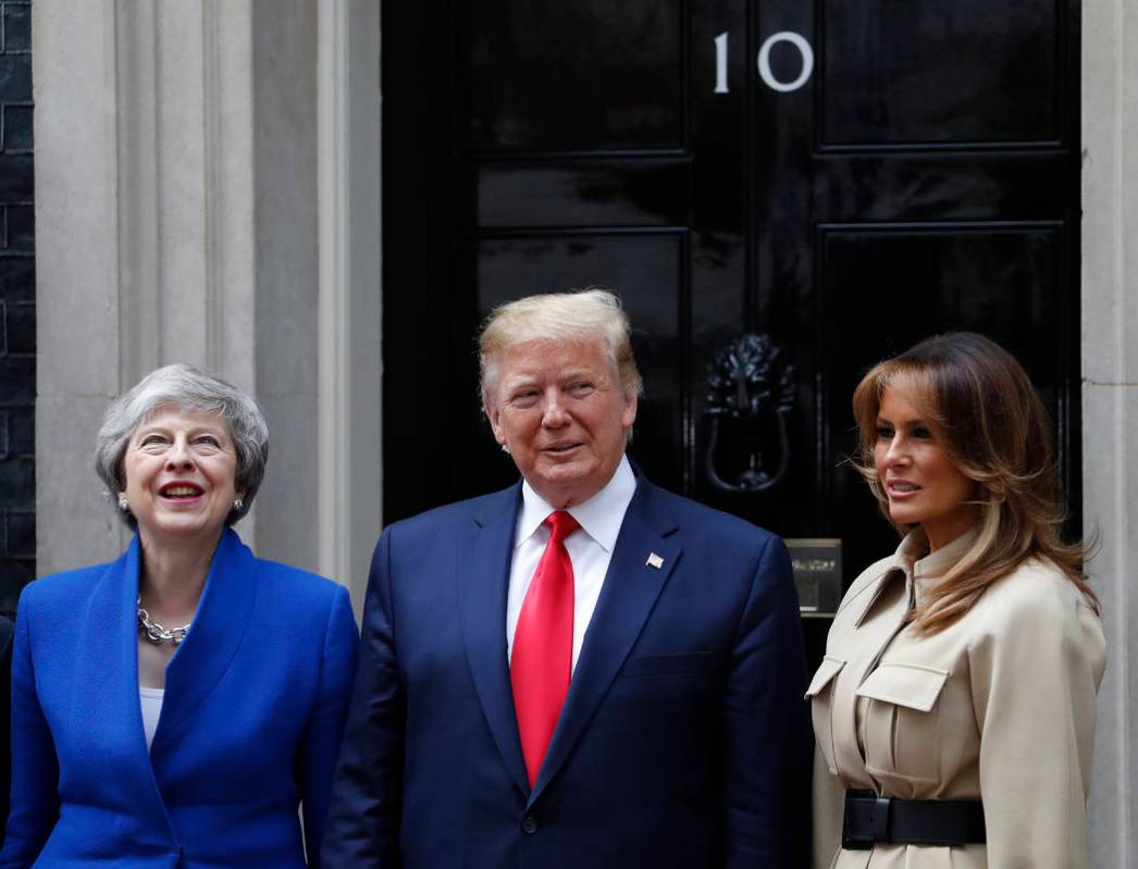 Britain's Prime Minister Theresa May welcomes President Donald Trump and first lady Melania, ri ...