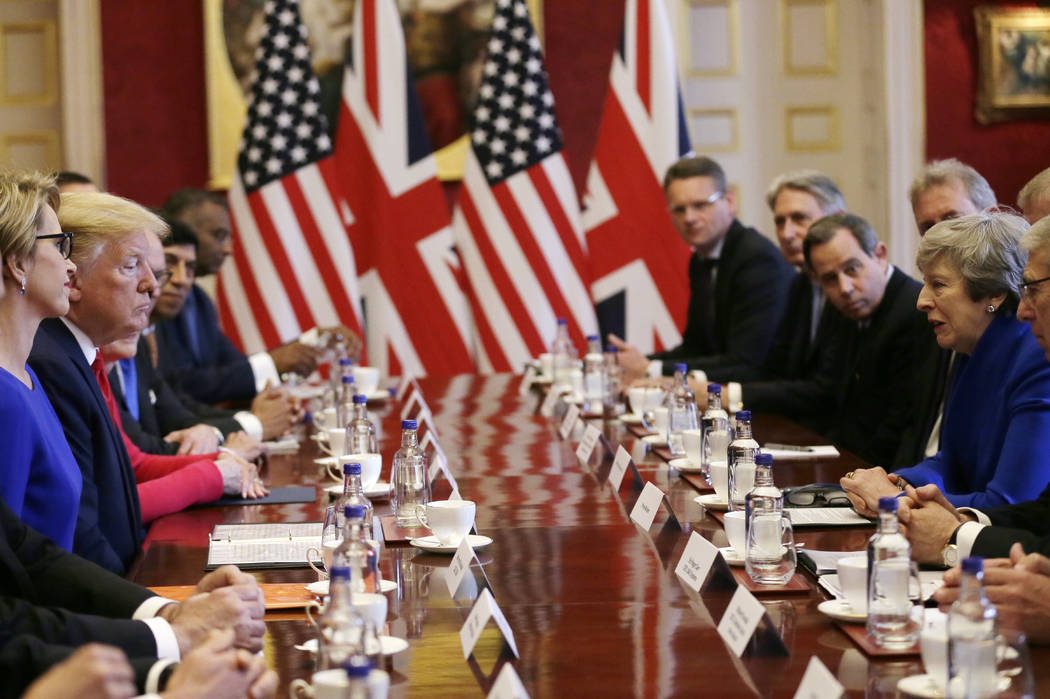 U.S President Donald Trump, center left, and British Prime Minister Theresa May, center right, ...