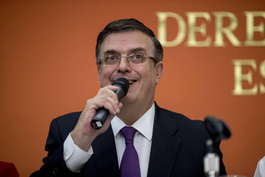 Mexican Foreign Affairs Secretary Marcelo Ebrard, center, speaks at a news conference at the Me ...