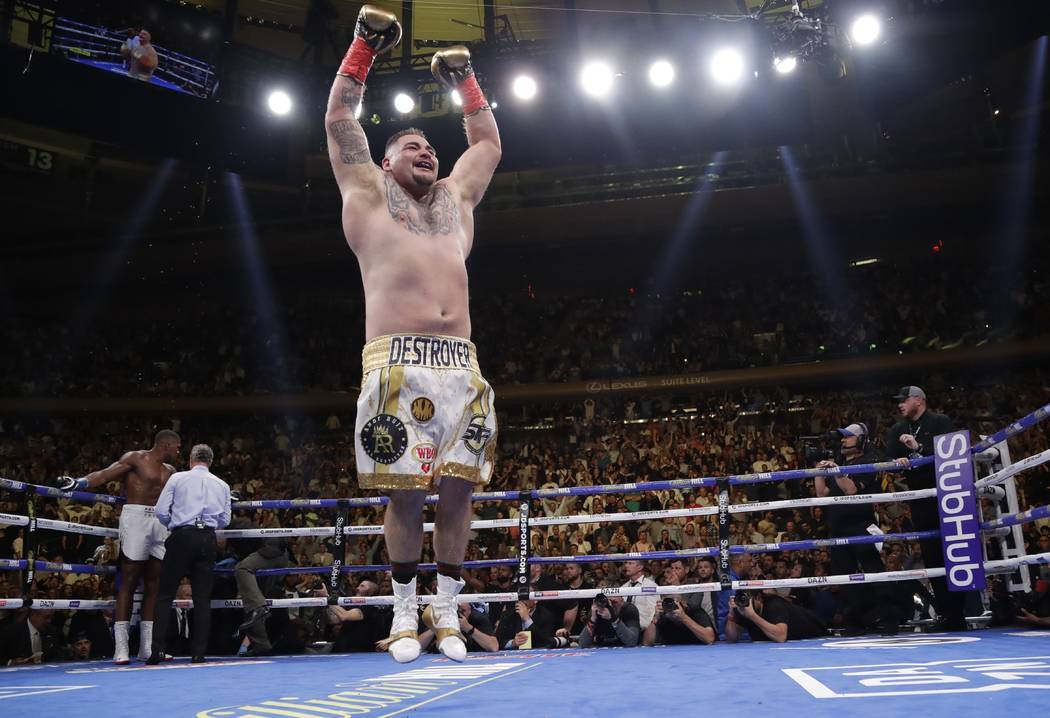 Andy Ruiz celebrates after stopping Anthony Joshua during the seventh round of a heavyweight ch ...