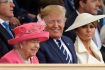 Queen Elizabeth II, President Donald Trump and first lady Melania Trump, from left, attend an e ...