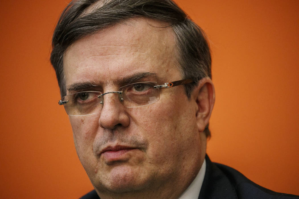 Marcelo Ebrard, Mexico's Secretary of Foreign Affairs, listens to a question during a news conf ...