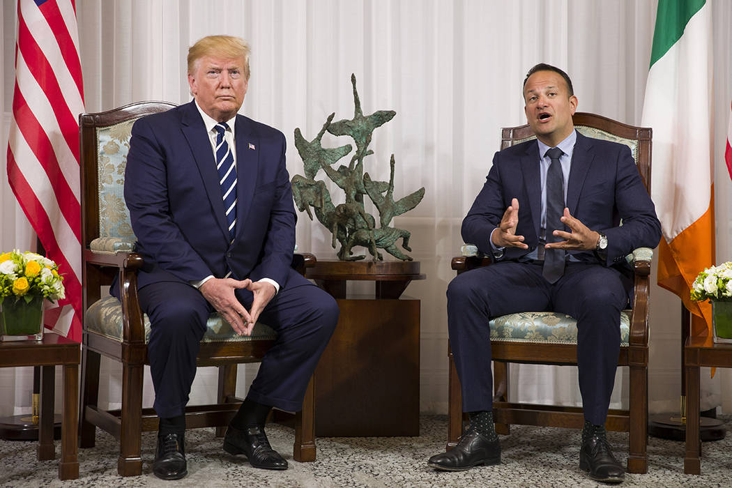 President Donald Trump listens as Irish Prime Minister Leo Varadkar, speaks before a meeting at ...