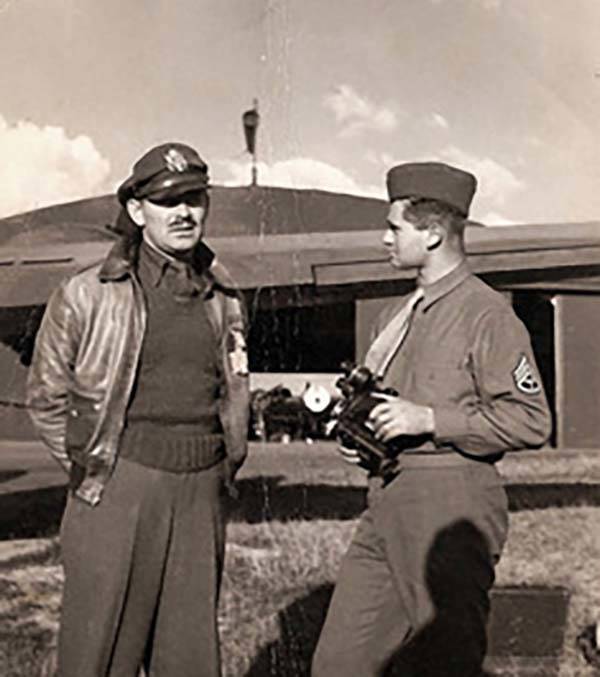 Young Army soldier Burton "Bud" Hartman, right, talks with actor Clark Gable in 1943 ...