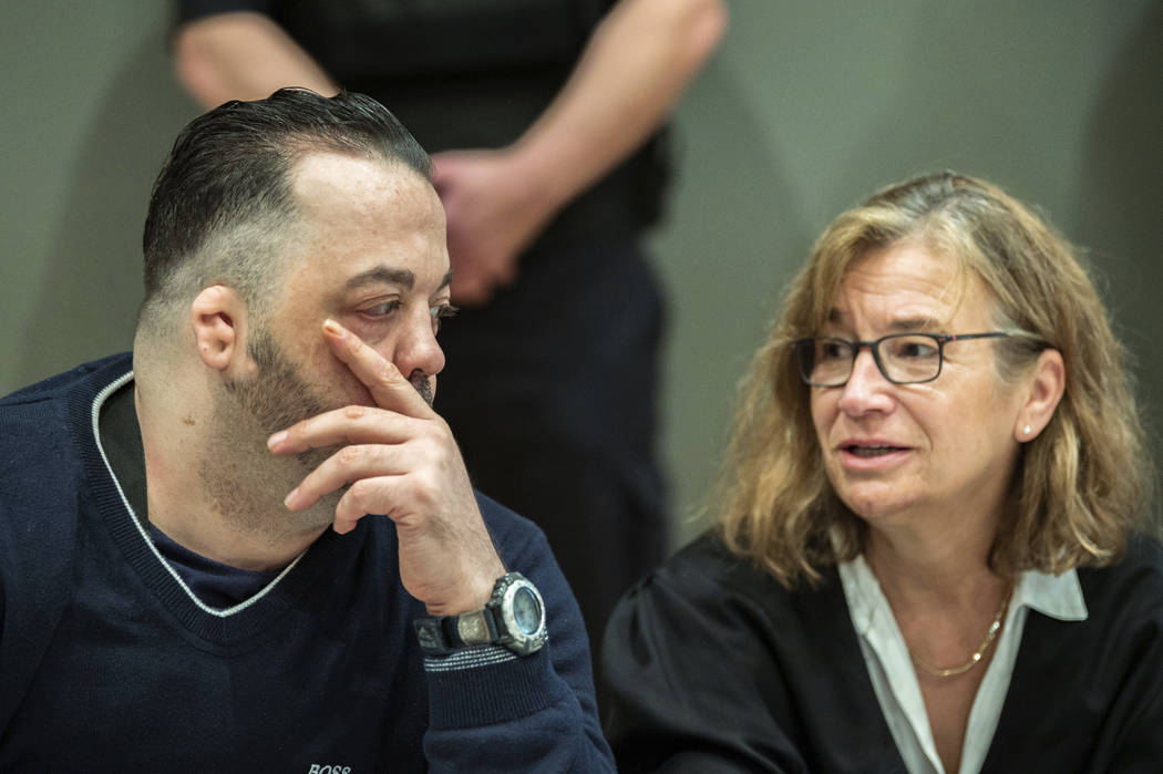 Former nurse Niels Hoegel, left, accused of multiple murder and attempted murder of patients, t ...