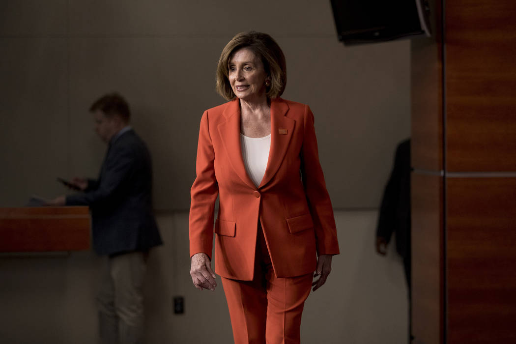 House Speaker Nancy Pelosi of Calif. arrives to meet with reporters at the Capitol in Washingto ...