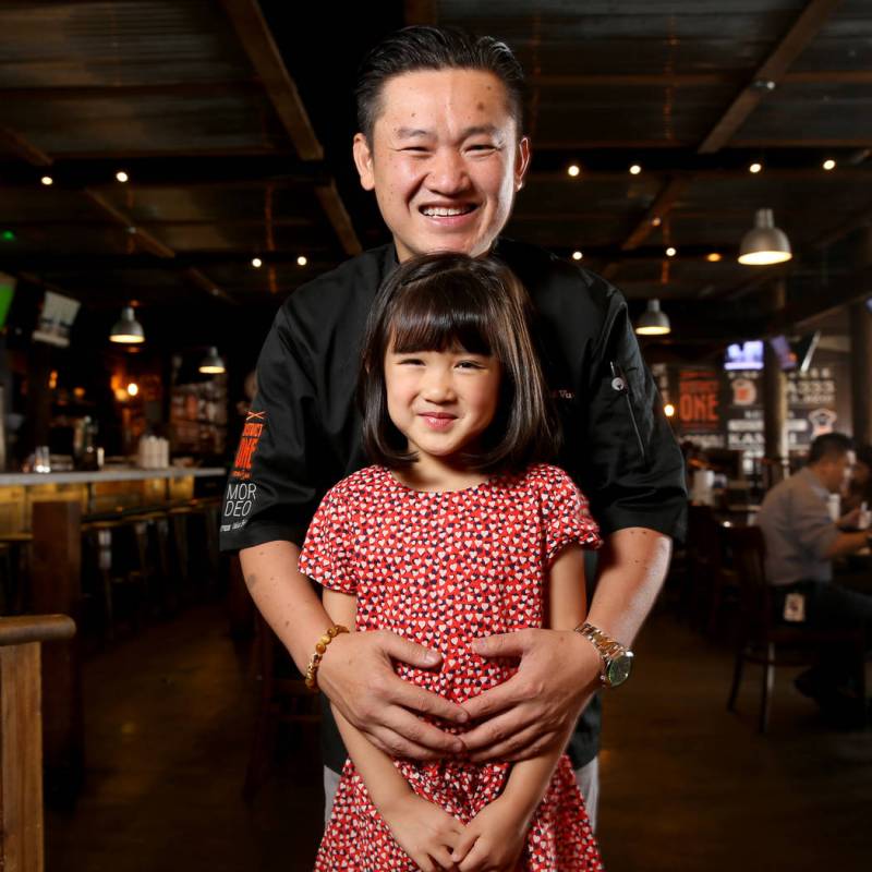 Chef Khai Vu and his daughter, Audrey, 5, at District One Kitchen & Bar in Las Vegas Monday ...