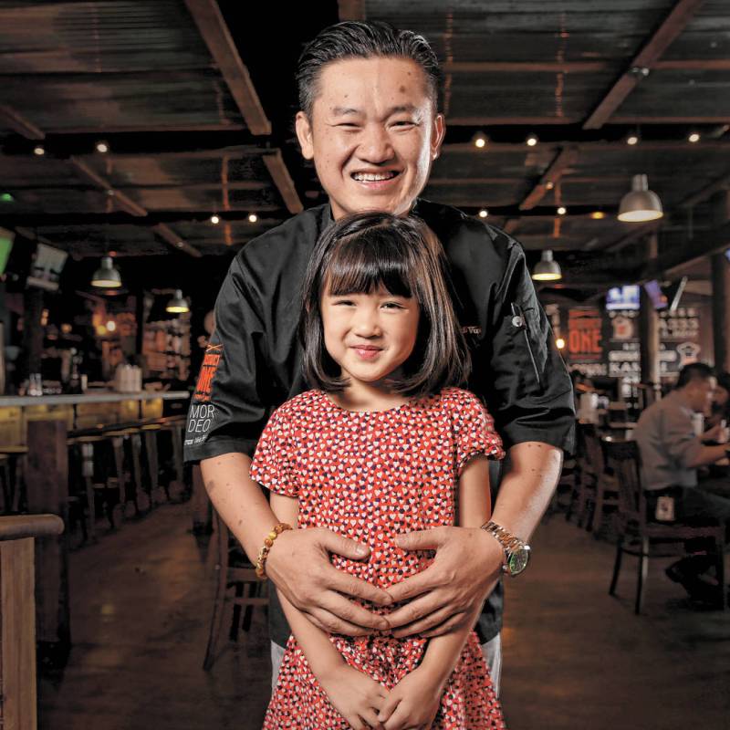 Chef Khai Vu and his daughter, Audrey, 5, at District One Kitchen & Bar in Las Vegas Monday ...