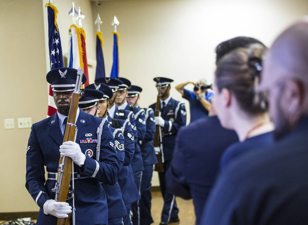 Members of the Nellis Air Force Base Honor Guard are seen at the start of a ceremony commemorat ...