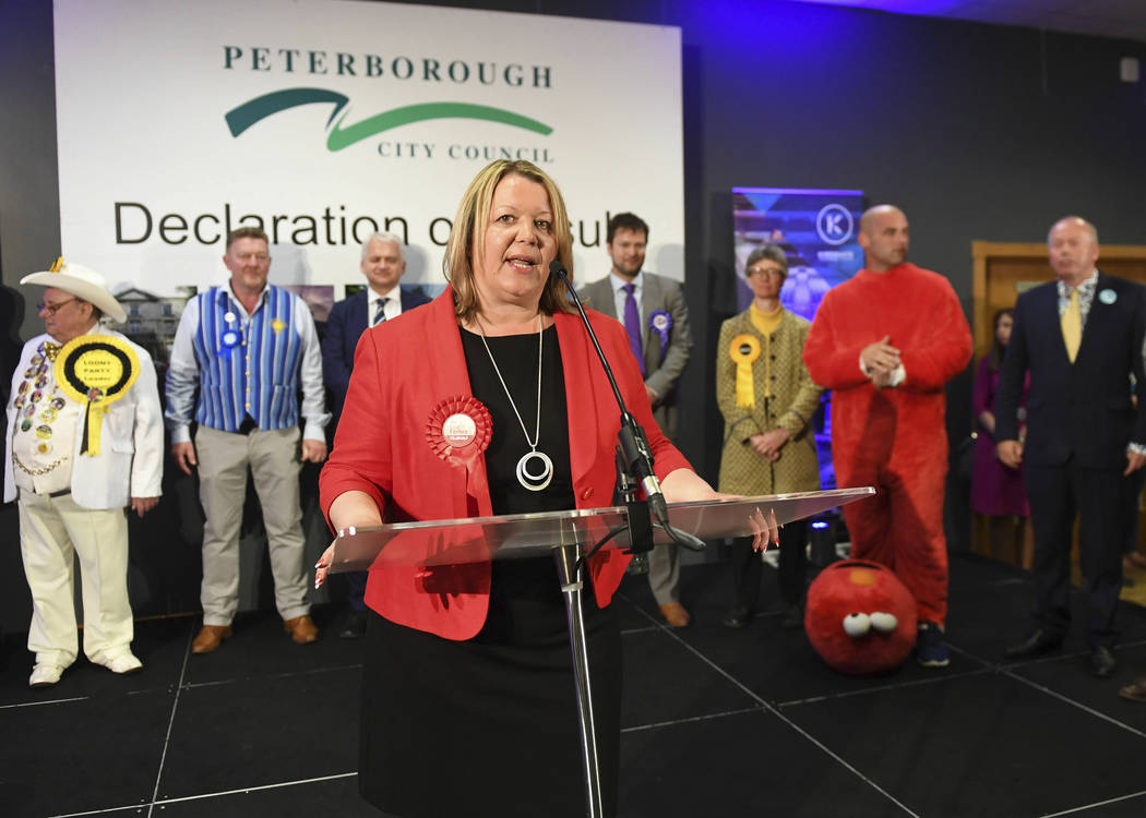 Newly elected Labour MP Lisa Forbes, center, gives her winner's speech after the count for the ...