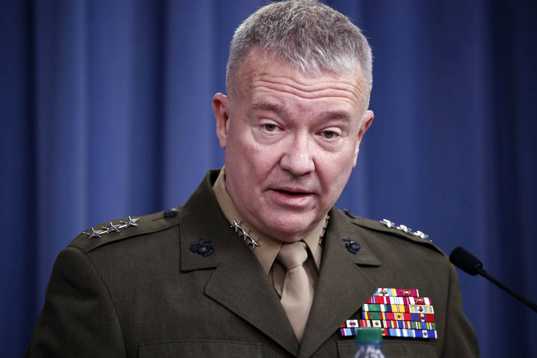 In an April1 14, 2018, file photo, then-Marine Lt. Gen. Kenneth "Frank" McKenzie speaks during ...