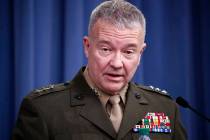 In an April1 14, 2018, file photo, then-Marine Lt. Gen. Kenneth "Frank" McKenzie speaks during ...